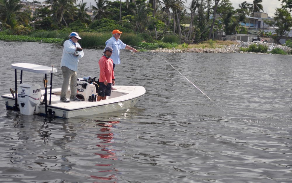 Fly-fisherman is tight on a good tarpon in Torrecilla Lagoon.