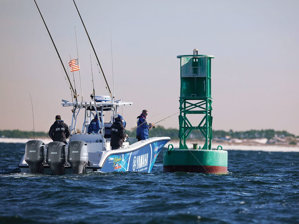 Anglers fishing buoy