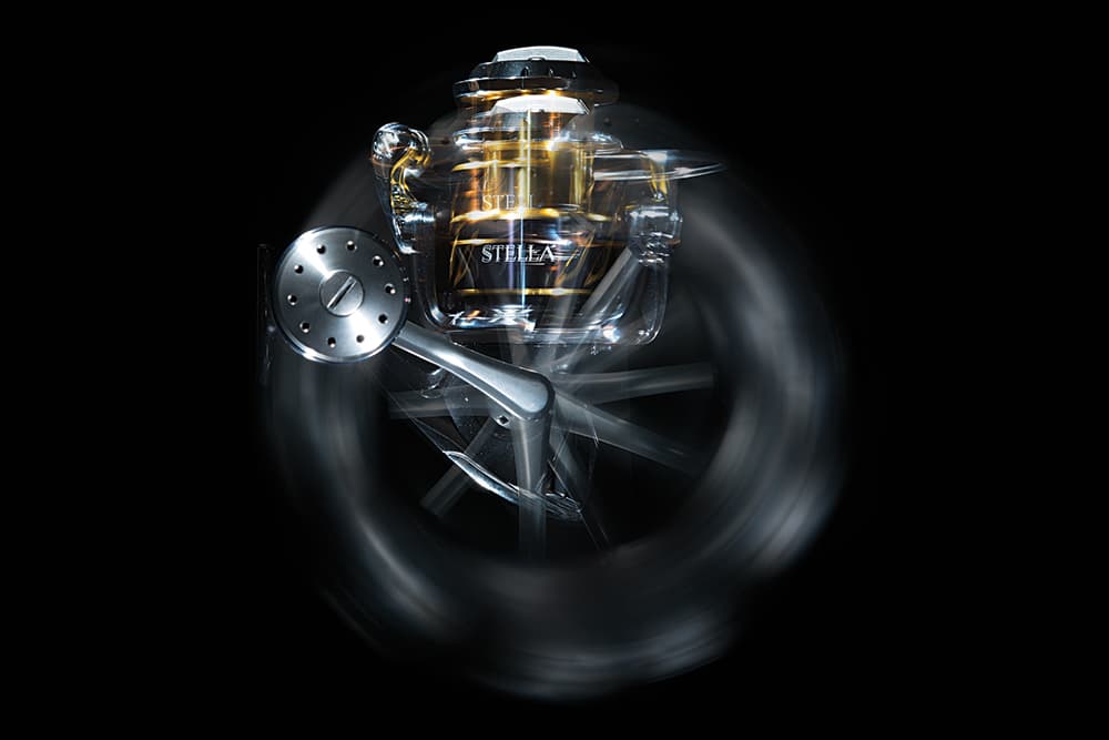 Spinning fishing reel turning at high-speed