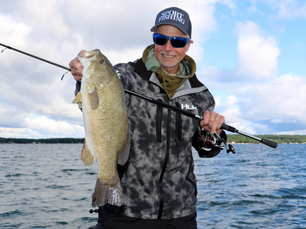 Angler with a large smallmouth bass